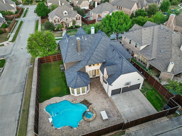 drone / aerial view with a residential view