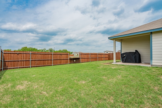 view of yard featuring a fenced backyard