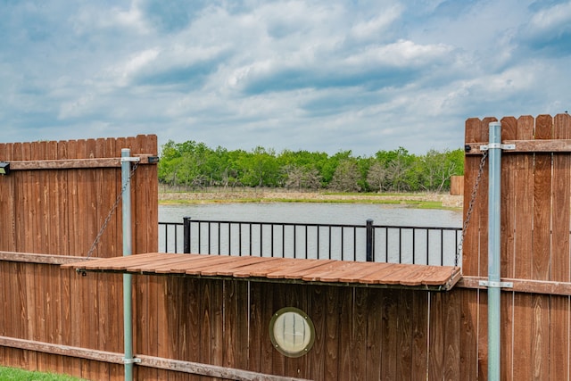 dock area featuring a water view