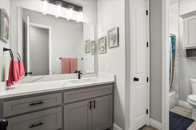 12409 Messer Ct, Fort Worth, TX 76126 - full bathroom with toilet, vanity, baseboards, and shower / bath combo