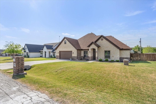 12409 Messer Ct, Fort Worth, TX 76126 - french country style house featuring concrete driveway, a garage, and stone siding