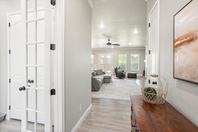 12409 Messer Ct, Fort Worth, TX 76126 - corridor featuring crown molding, light wood finished floors, baseboards, recessed lighting, and french doors