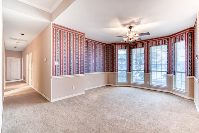 2176 English Rd, Rockwall, TX 75032 - carpeted empty room featuring visible vents, ornamental molding, baseboards, and ceiling fan