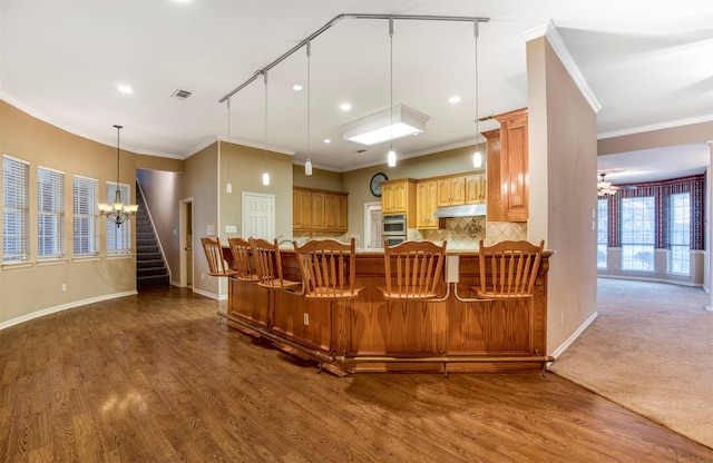 2176 English Rd, Rockwall, TX 75032 - living room featuring visible vents, baseboards, a notable chandelier, and dark wood-style floors