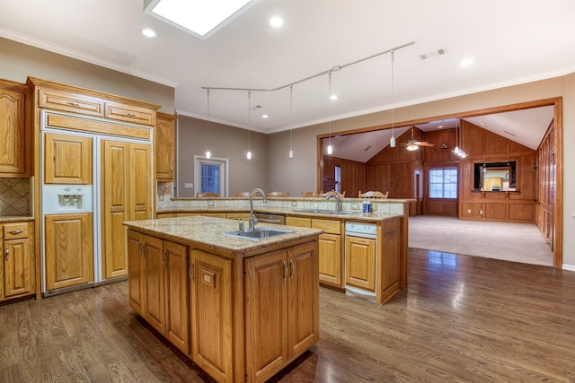 2176 English Rd, Rockwall, TX 75032 - kitchen featuring dark wood-style floors, visible vents, paneled built in fridge, a sink, and a center island with sink