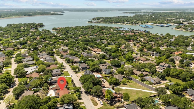 bird's eye view with a residential view and a water view