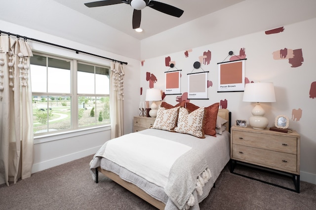 carpeted bedroom with baseboards and a ceiling fan