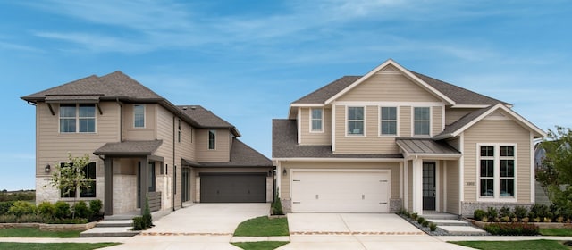 view of front of house featuring stone siding, roof with shingles, concrete driveway, and an attached garage
