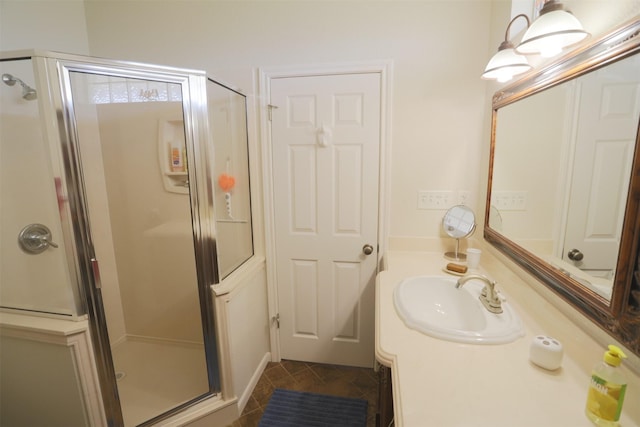 full bathroom with tile patterned floors, vanity, and a shower stall