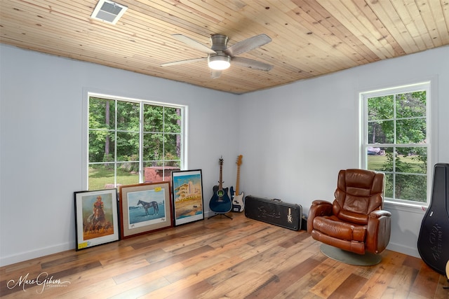 1042 N Lane Dr, Shreveport, LA 71107 - living area with ceiling fan, a healthy amount of sunlight, hardwood / wood-style floors, and visible vents