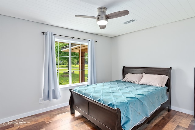 1042 N Lane Dr, Shreveport, LA 71107 - bedroom with wood finished floors, visible vents, wooden ceiling, baseboards, and ceiling fan