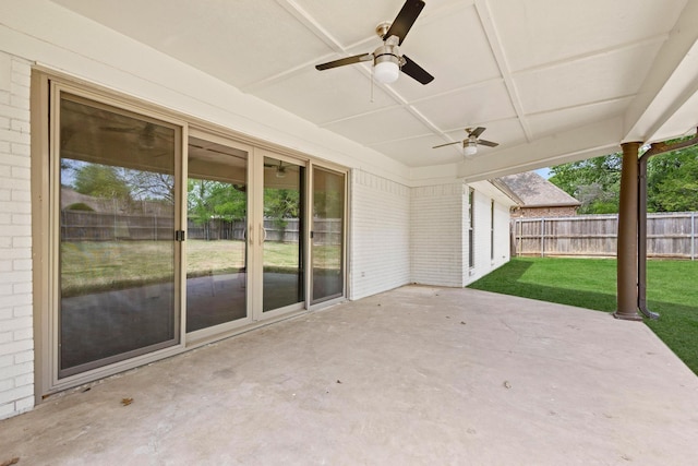 view of patio / terrace with a fenced backyard and a ceiling fan