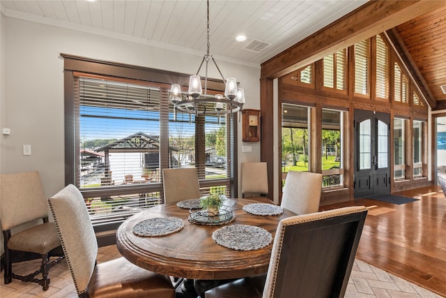 dining area with light wood finished floors, wooden ceiling, a notable chandelier, visible vents, and recessed lighting