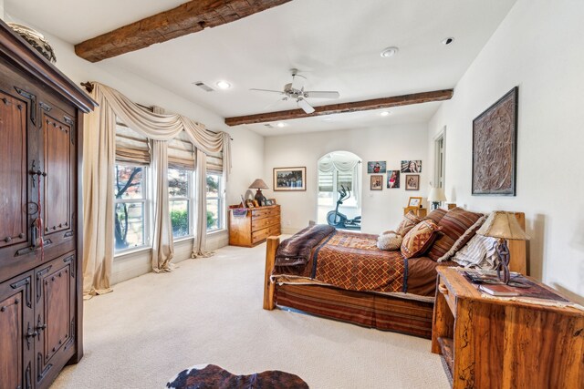 bedroom with visible vents, recessed lighting, beam ceiling, and light colored carpet