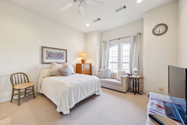 bedroom with carpet flooring, recessed lighting, and visible vents