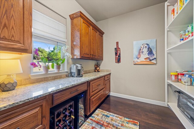 interior space with baseboards and dark wood-style floors