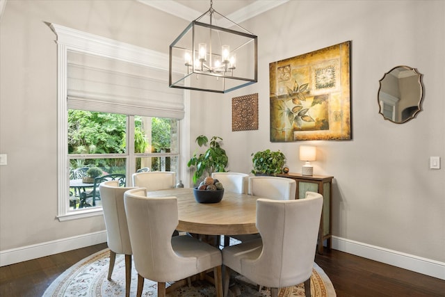 dining room featuring baseboards, a notable chandelier, and dark wood-style floors