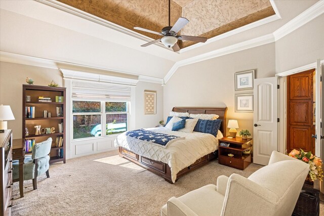 bedroom featuring crown molding, carpet floors, and ceiling fan