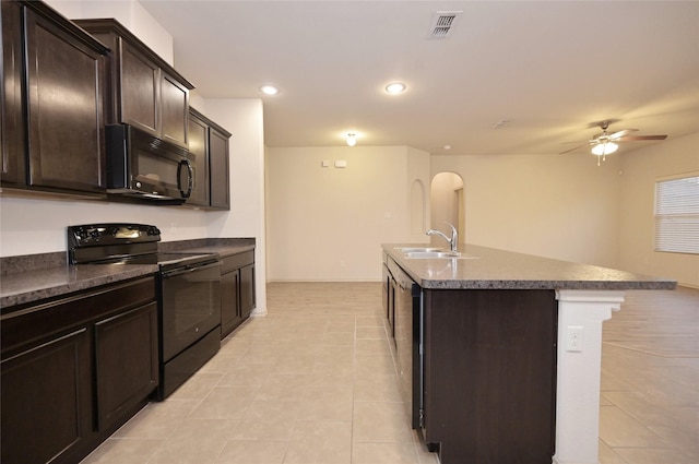 kitchen with light tile patterned floors, ceiling fan, a sink, and black appliances