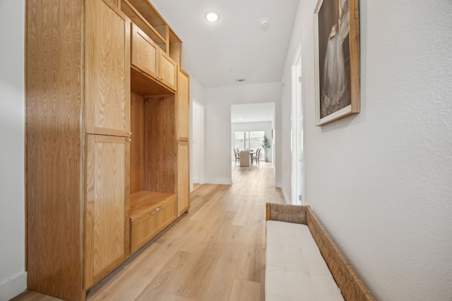 2016 Portofino Dr, Rockwall, TX 75032 - mudroom with visible vents, light wood finished floors, and baseboards
