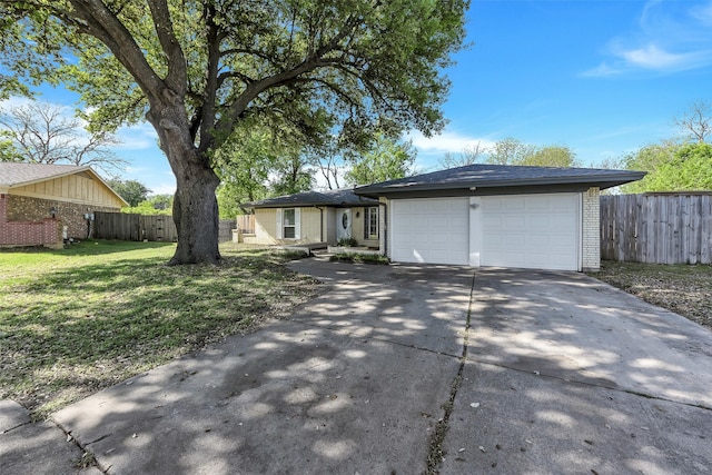 1800 W Queens Ct, Arlington, TX 76014 - ranch-style house with brick siding, driveway, and an attached garage
