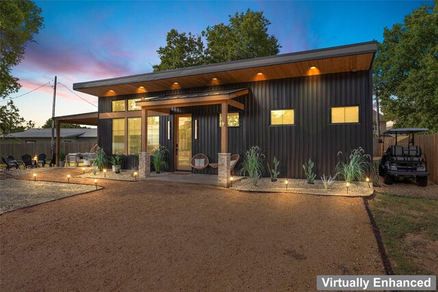 birds eye view of property featuring a residential view and a water view