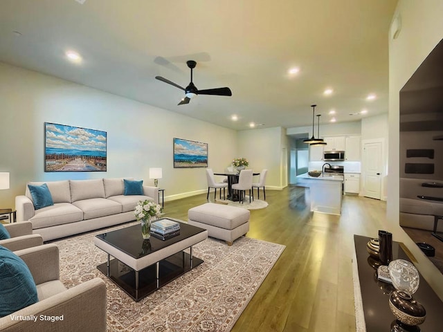 615 Cloverleaf Dr, Wylie, TX 75098 - living room featuring light wood-style floors, a ceiling fan, recessed lighting, and baseboards