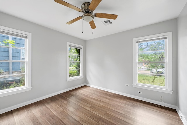 3717 Parkwood St, Waco, TX 76710 - spare room with a wealth of natural light, wood finished floors, and visible vents