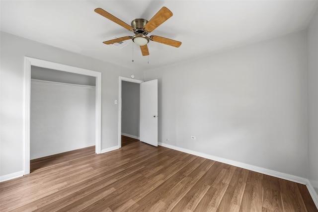 3717 Parkwood St, Waco, TX 76710 - unfurnished bedroom featuring wood finished floors, a closet, a ceiling fan, and baseboards