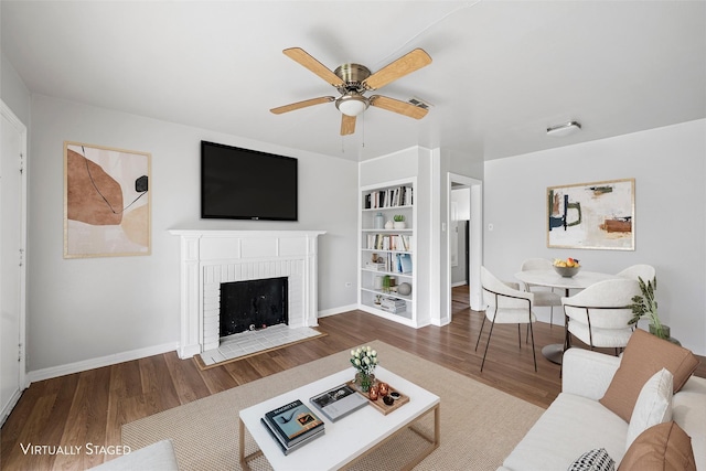 3717 Parkwood St, Waco, TX 76710 - living room featuring ceiling fan, baseboards, and wood finished floors