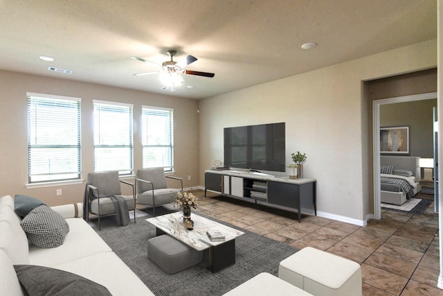 living area featuring recessed lighting, tile patterned flooring, visible vents, baseboards, and ceiling fan