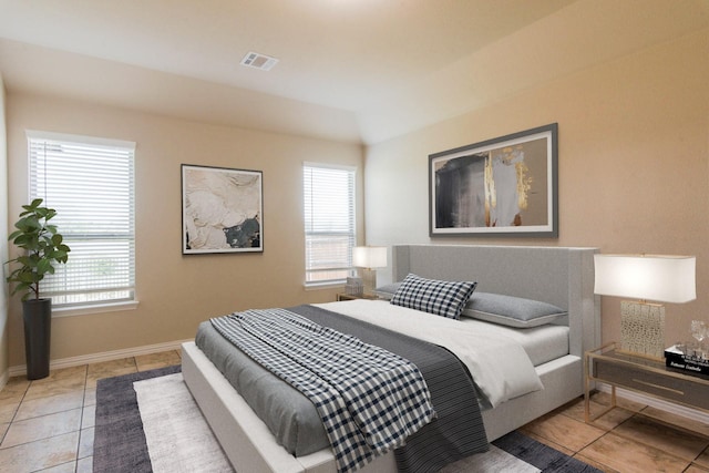bedroom with baseboards, light tile patterned flooring, multiple windows, and visible vents