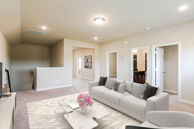 living room with recessed lighting, carpet floors, visible vents, and baseboards