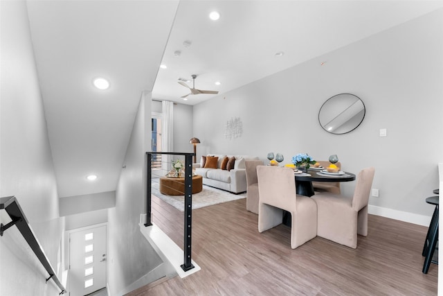 dining space with recessed lighting, a ceiling fan, baseboards, and wood finished floors