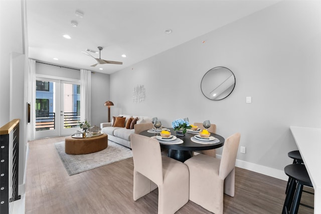 dining room featuring visible vents, wood finished floors, baseboards, ceiling fan, and recessed lighting