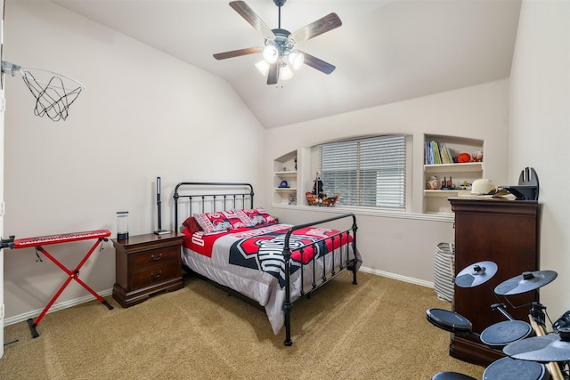 bedroom with baseboards, lofted ceiling, ceiling fan, and carpet