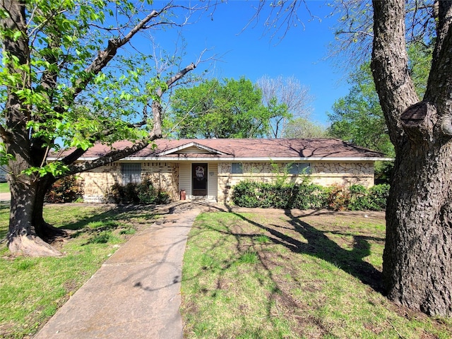 934 Starlight Dr, Sherman, TX 75090 - view of front facade featuring a front yard and brick siding