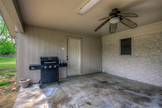 view of patio with grilling area and ceiling fan