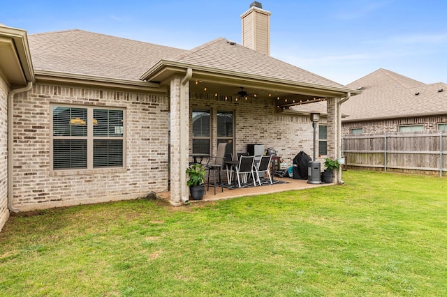 10009 Wildberry Dr, Waco, TX 76712 - rear view of property with brick siding, a fenced backyard, ceiling fan, and a patio