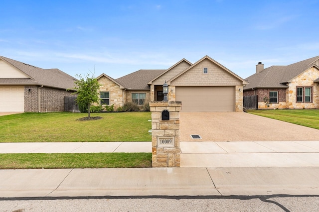 10009 Wildberry Dr, Waco, TX 76712 - ranch-style house with fence, a garage, concrete driveway, stone siding, and a front lawn