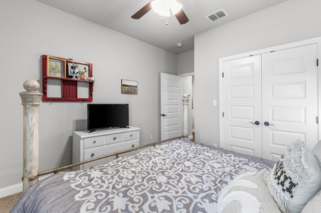 10009 Wildberry Dr, Waco, TX 76712 - carpeted bedroom with baseboards, a closet, visible vents, and a ceiling fan