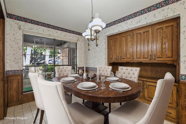 5112 River Ridge Rd, Arlington, TX 76017 - dining space with wallpapered walls, light tile patterned floors, and a wainscoted wall