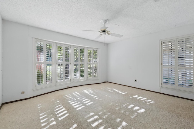 5112 River Ridge Rd, Arlington, TX 76017 - unfurnished room with ceiling fan, a textured ceiling, carpet, and baseboards