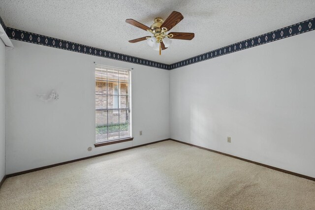 5112 River Ridge Rd, Arlington, TX 76017 - carpeted empty room with a ceiling fan, a textured ceiling, and baseboards