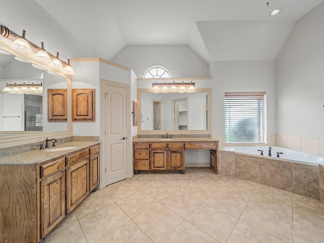 full bathroom with a bath, lofted ceiling, tile patterned flooring, and a sink