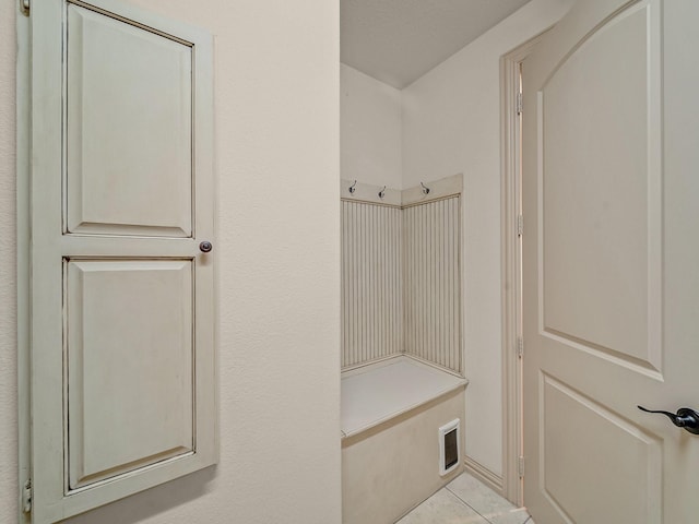 mudroom with tile patterned flooring