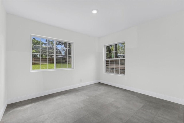 1125 Rodeo Center Blvd, Mesquite, TX 75149 - spare room with baseboards and recessed lighting