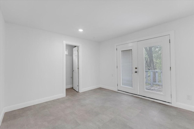 1125 Rodeo Center Blvd, Mesquite, TX 75149 - spare room featuring french doors, baseboards, and recessed lighting