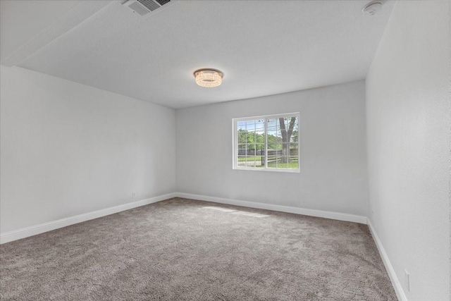 1125 Rodeo Center Blvd, Mesquite, TX 75149 - empty room with carpet, a smoke detector, and baseboards
