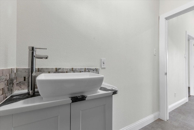 1125 Rodeo Center Blvd, Mesquite, TX 75149 - bathroom featuring a sink and baseboards